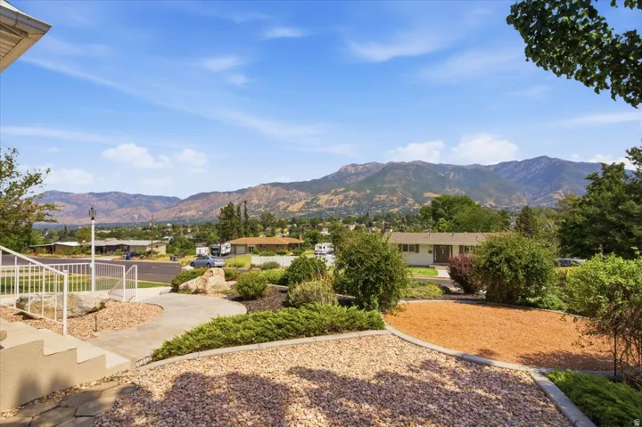 Landscaped front yard with decorative gravel and established plantings