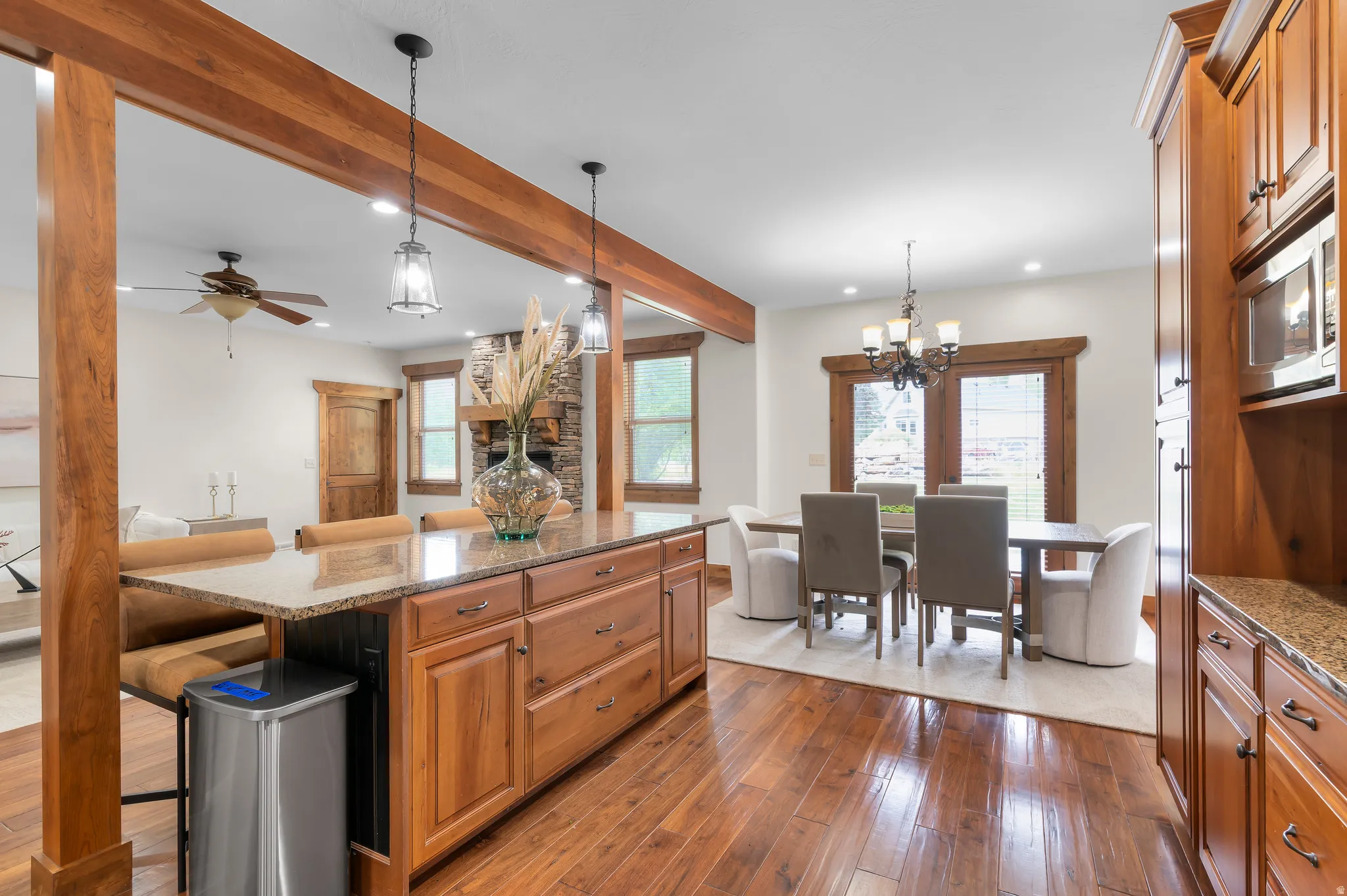 Expansive wood-finish flooring throughout