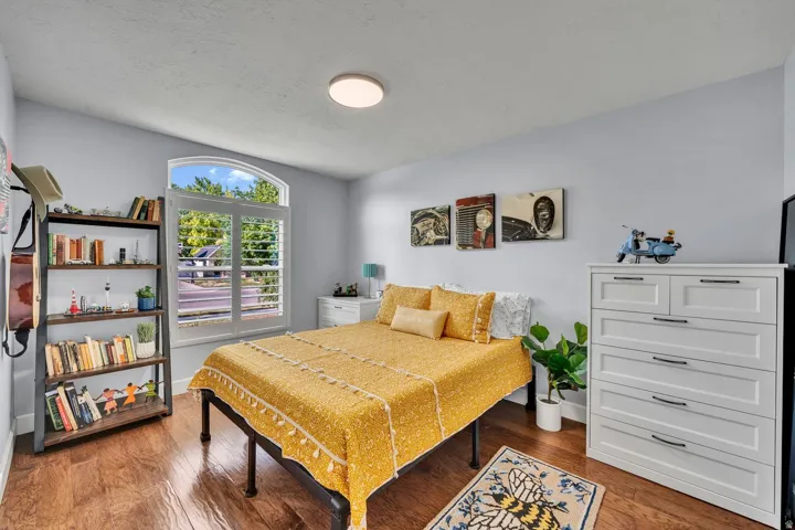 Wood-finish flooring with light blue wall paint