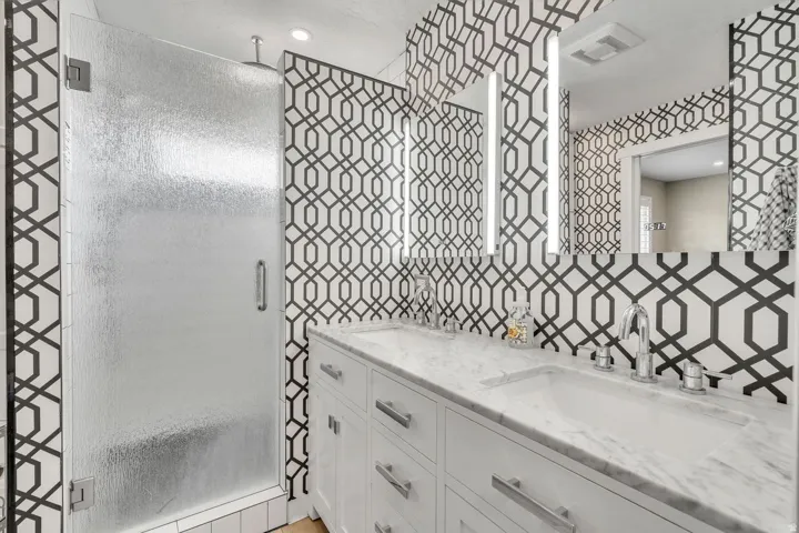 Dual vanity with stone countertop and integrated sinks