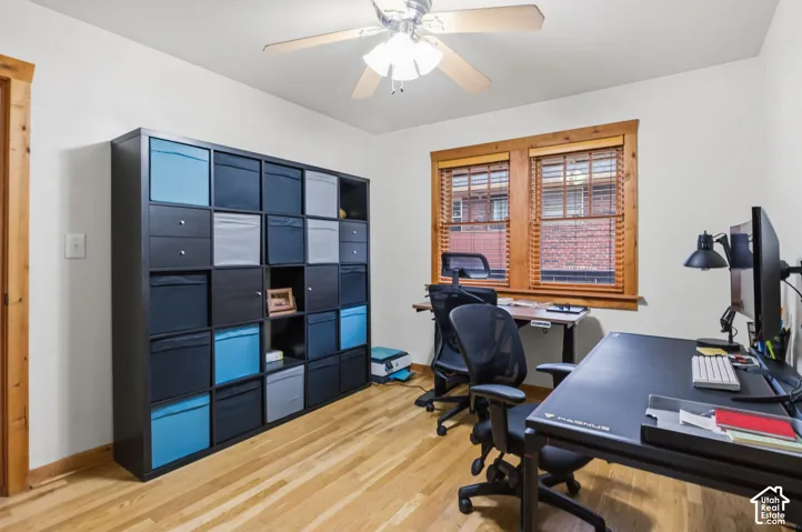 Office or could be a bedroom just no closet. Wood-finish flooring with white walls