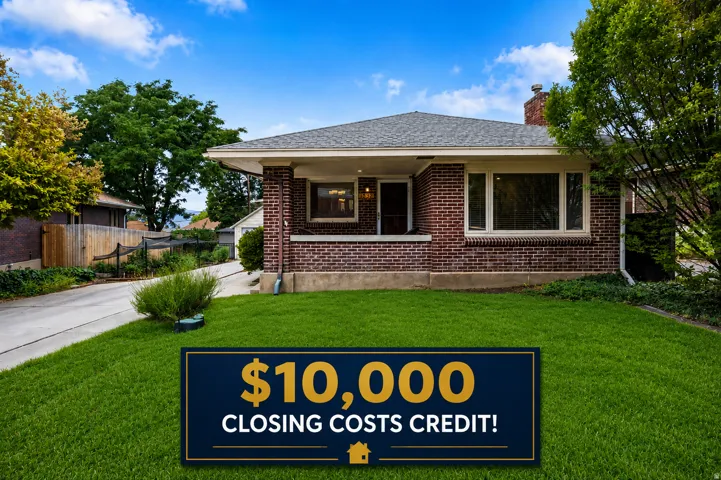 AI for greener grass! Brick exterior with a covered front porch and multi-pane windows