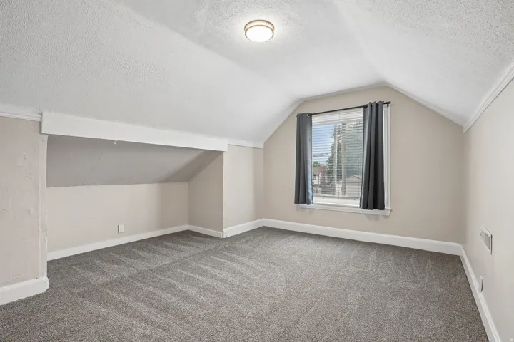 Angled ceiling lines with recessed storage nook