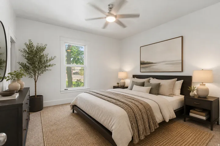Virtual Staged. Bright room with a window, overhead fan, and recessed lighting