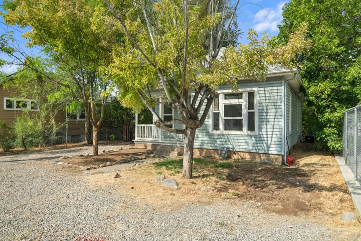 Light blue siding exterior with white trim
