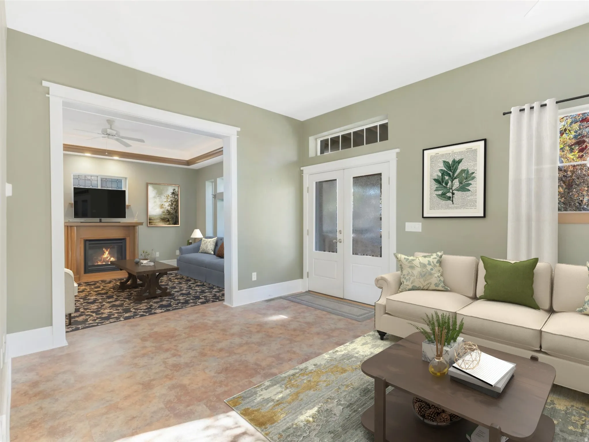 Warm-toned flooring and light green walls define this bright space
