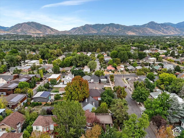 Mountain and valley views, residential neighborhood with mature trees and mountain backdrop