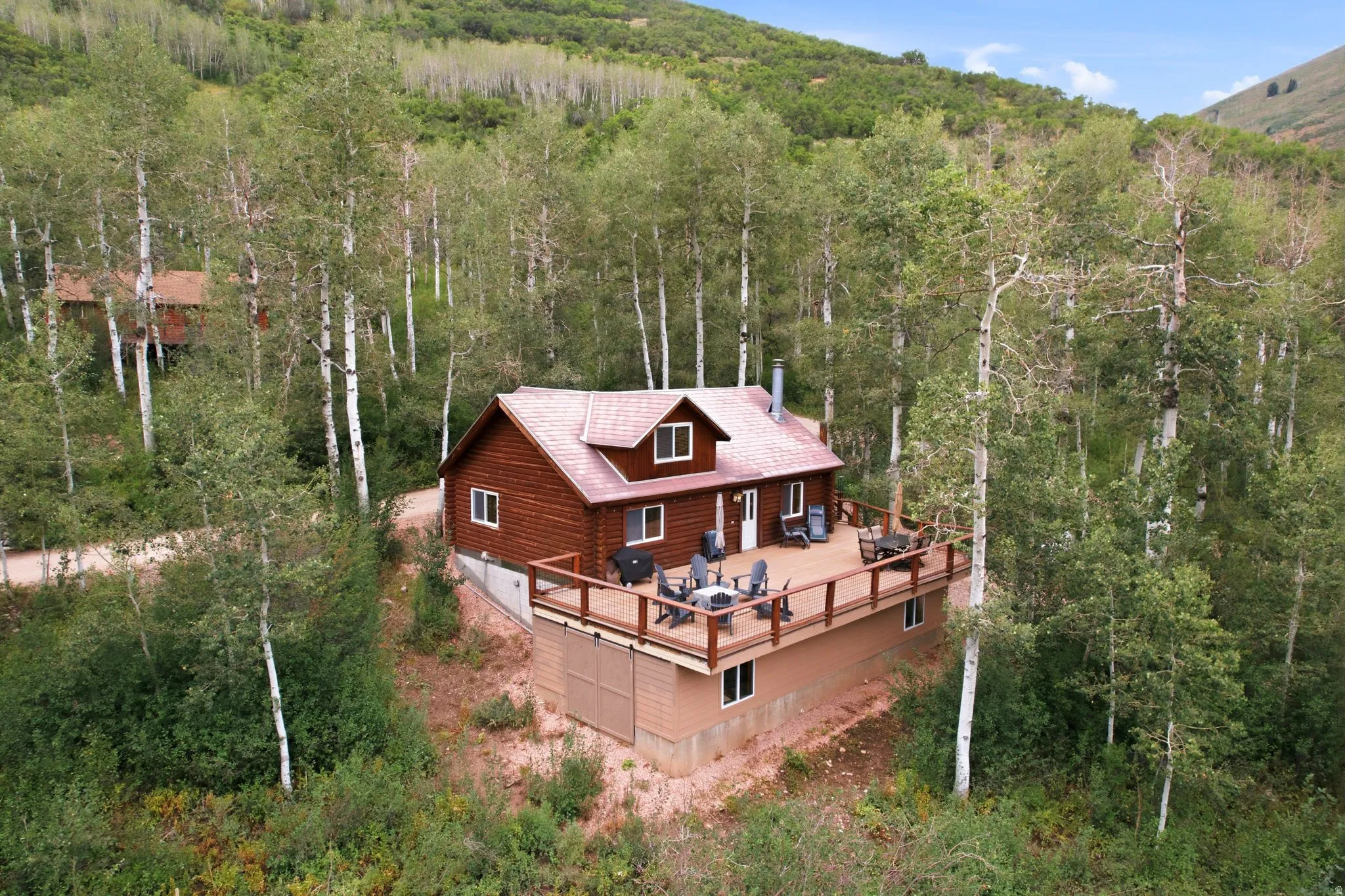 Log cabin-style exterior with a red roof