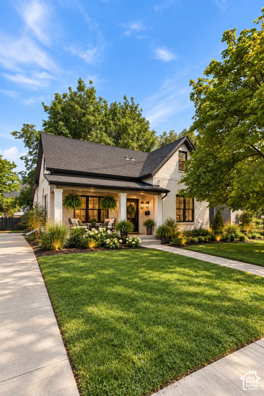 White brick exterior with black framed windows