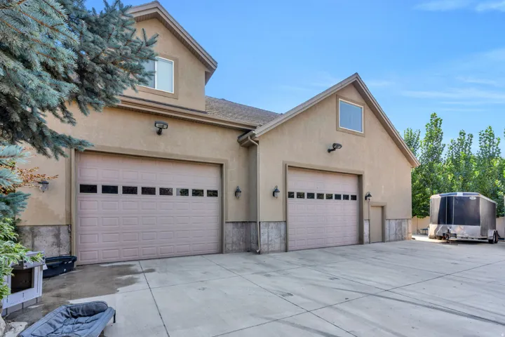 Detached shop located behind the home with over 1500 square feet of living space finished above.  Potential mother in law apartment or home business area.