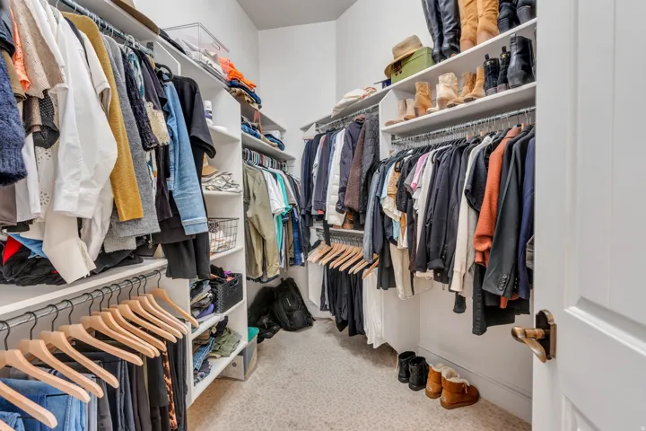 Primary suite large walk in closet.