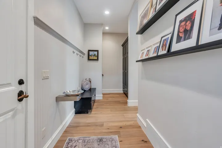 Mudroom with storage for coats and shoes.  Water fountain for drinks.