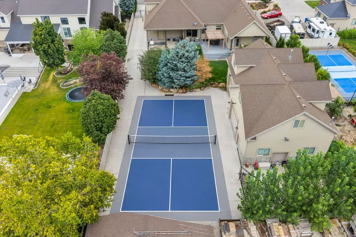 Large concrete area in front of shop.  Large enough for a full size pickle ball court. (Picture of potential pickle ball court.  There is not currently a court).