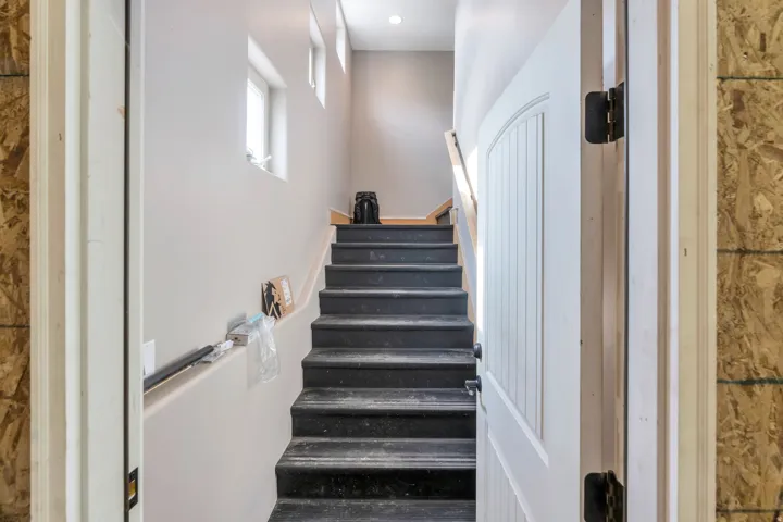 Stairs in detached garage leading up to finished living area.  Great for home business or potential MIL.