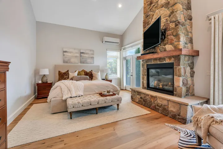 Primary suite with vaulted ceiling.