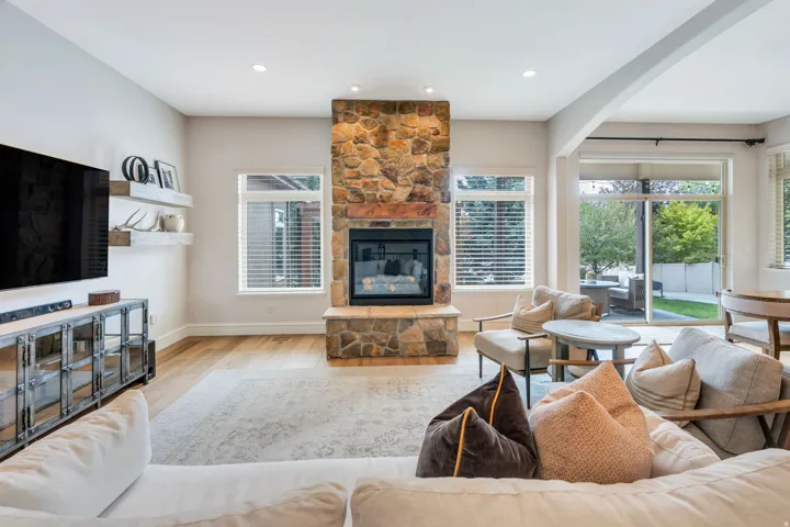 Open and spacious great room with glass doors to back deck.