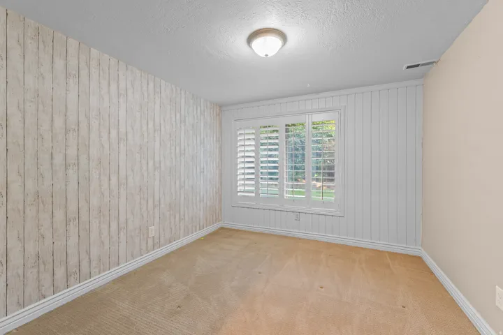 Window with white plantation shutters
