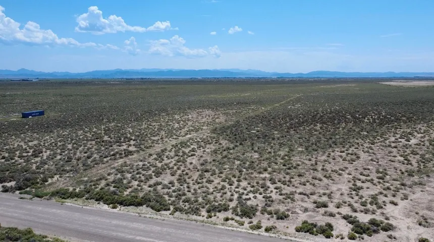 Expansive open terrain with natural vegetation