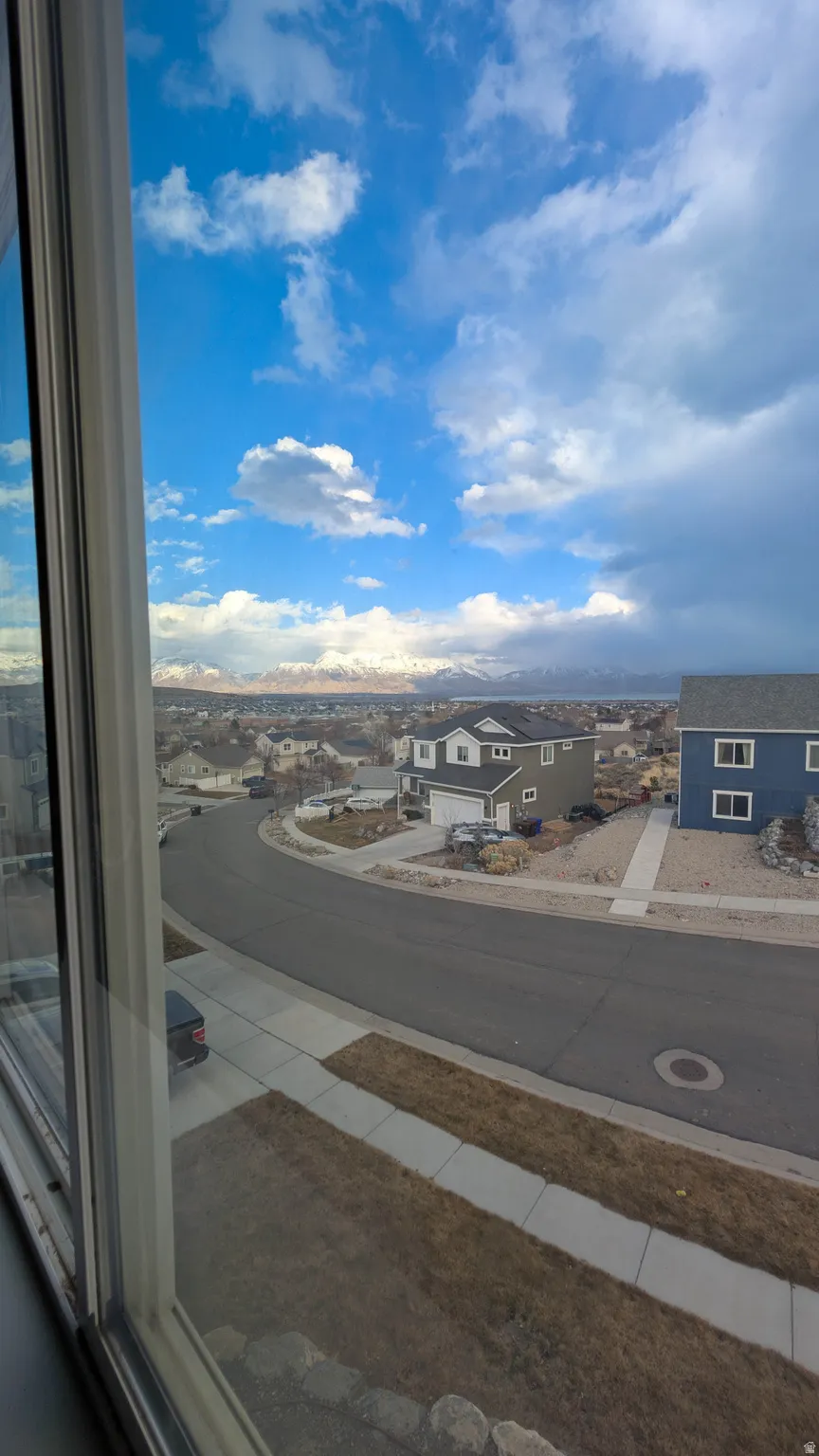 Clear window framing a panoramic landscape
