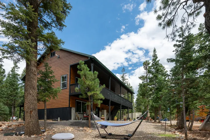 Wood-sided exterior with a two-story design and covered balcony