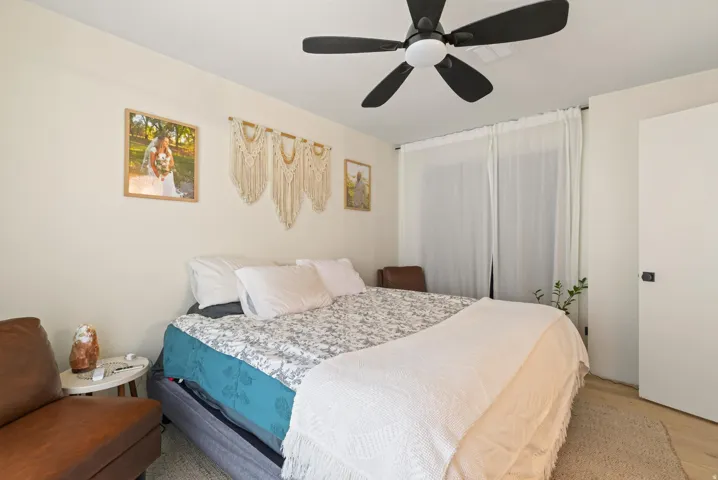 Recessed lighting and a modern ceiling fan with integrated lighting