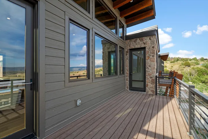 Expansive outdoor deck with wood-finish flooring