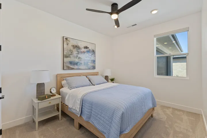 Carpeted flooring, recessed lighting, and a ceiling fan with integrated lighting