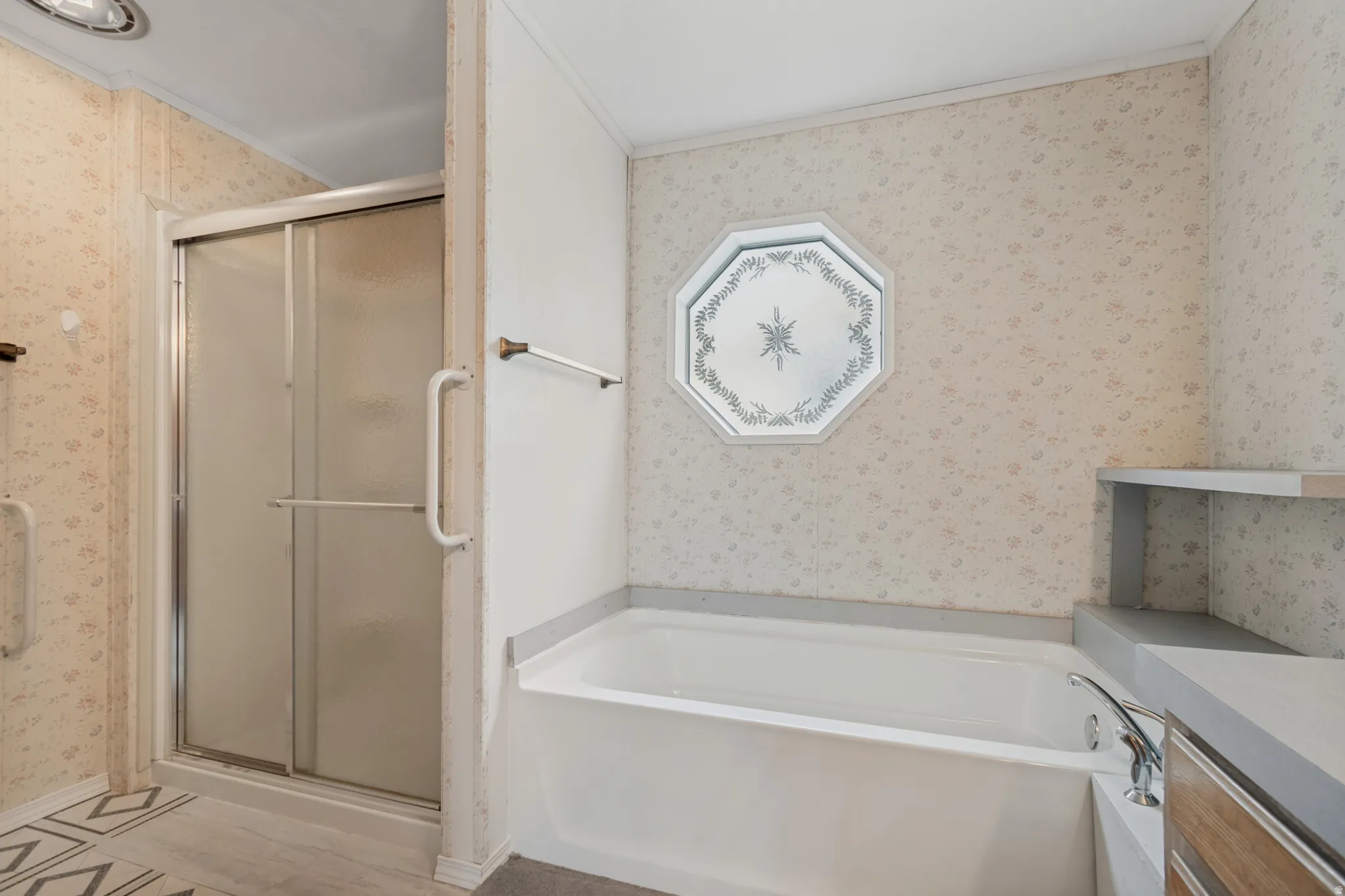 Primary Bathroom with double sinks, garden tub and walk in shower.