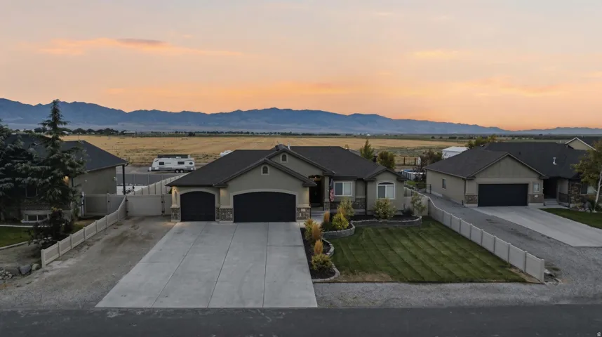 Single-story residence with a two-car garage and a concrete driveway