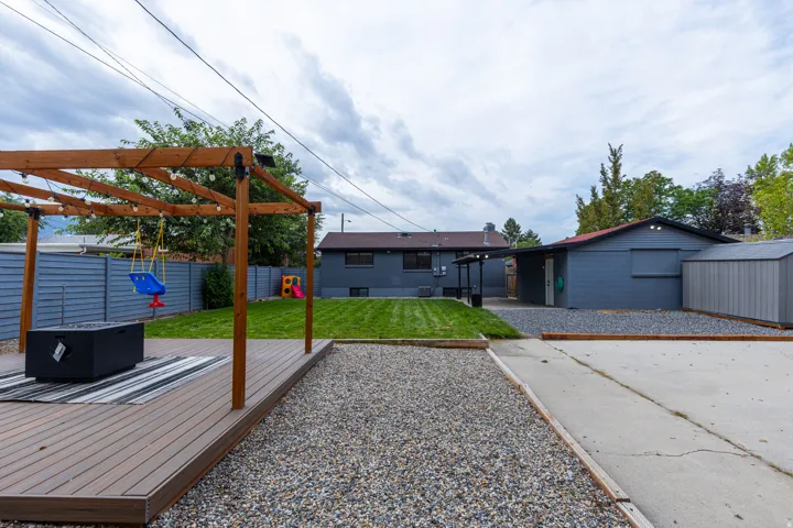 Large Backyard with Covered Patio, Pergola/Firepit, Large Storage Shed, Large Concrete Pad, and Chicken Coop