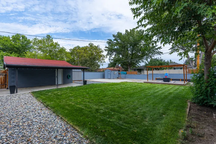 Large Backyard with Covered Patio, Pergola/Firepit, Large Storage Shed, Large Concrete Pad, and Chicken Coop