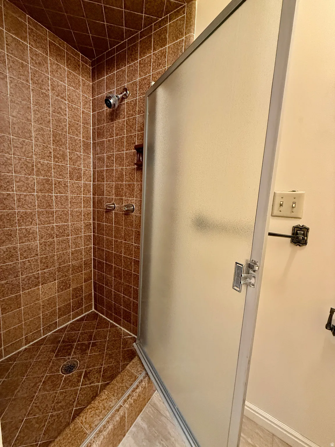 Master Bathroom with his and her closets, double vanity, and walk-in shower.