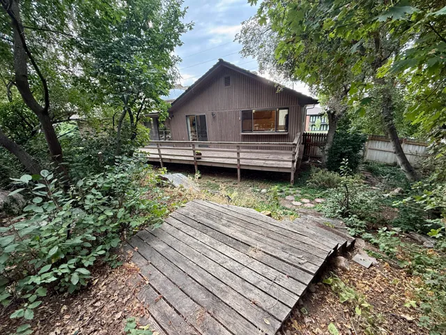 Wood-sided exterior with a gabled roofline