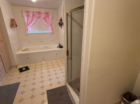 Built-in soaking tub with decorative tile surround