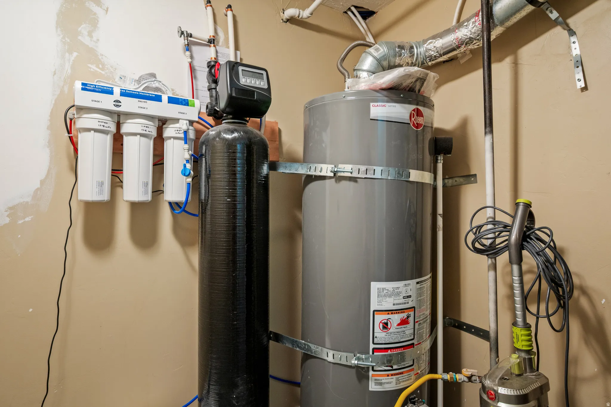 Water filtration system, water softener, and water heater
