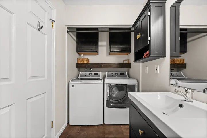 Integrated laundry area with wood-finish flooring