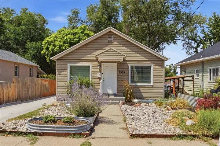 Siding exterior with a gabled roofline