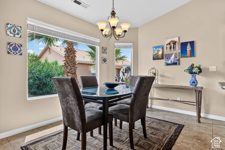 Neutral tone walls with an angular vaulted ceiling