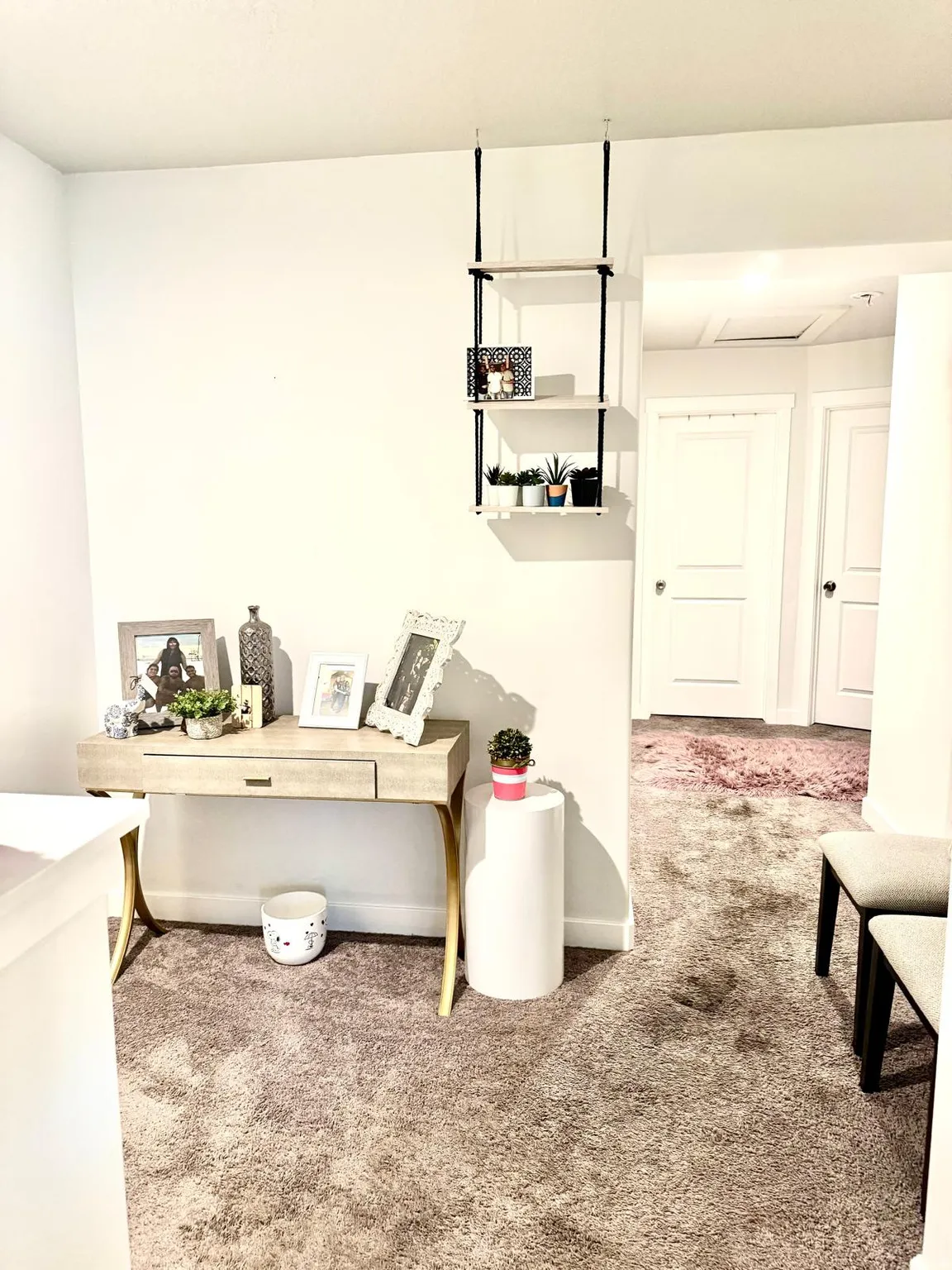 Wall-mounted shelving unit and flush-mounted ceiling lighting