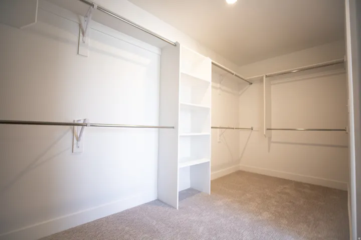 Walk-in closet for primary bedroom