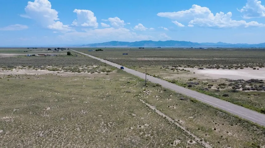 Expansive flat terrain featuring natural ground cover