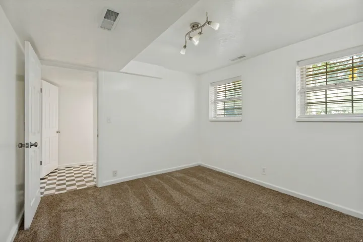 Fourth bedroom with easy access to second bath - main lower level