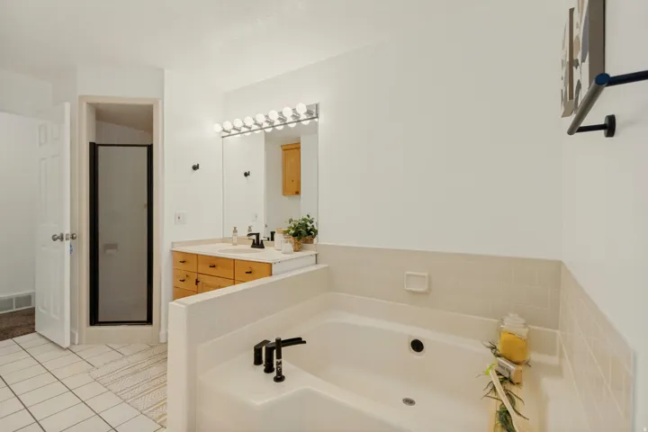 Upper level bath with separate tub and shower
