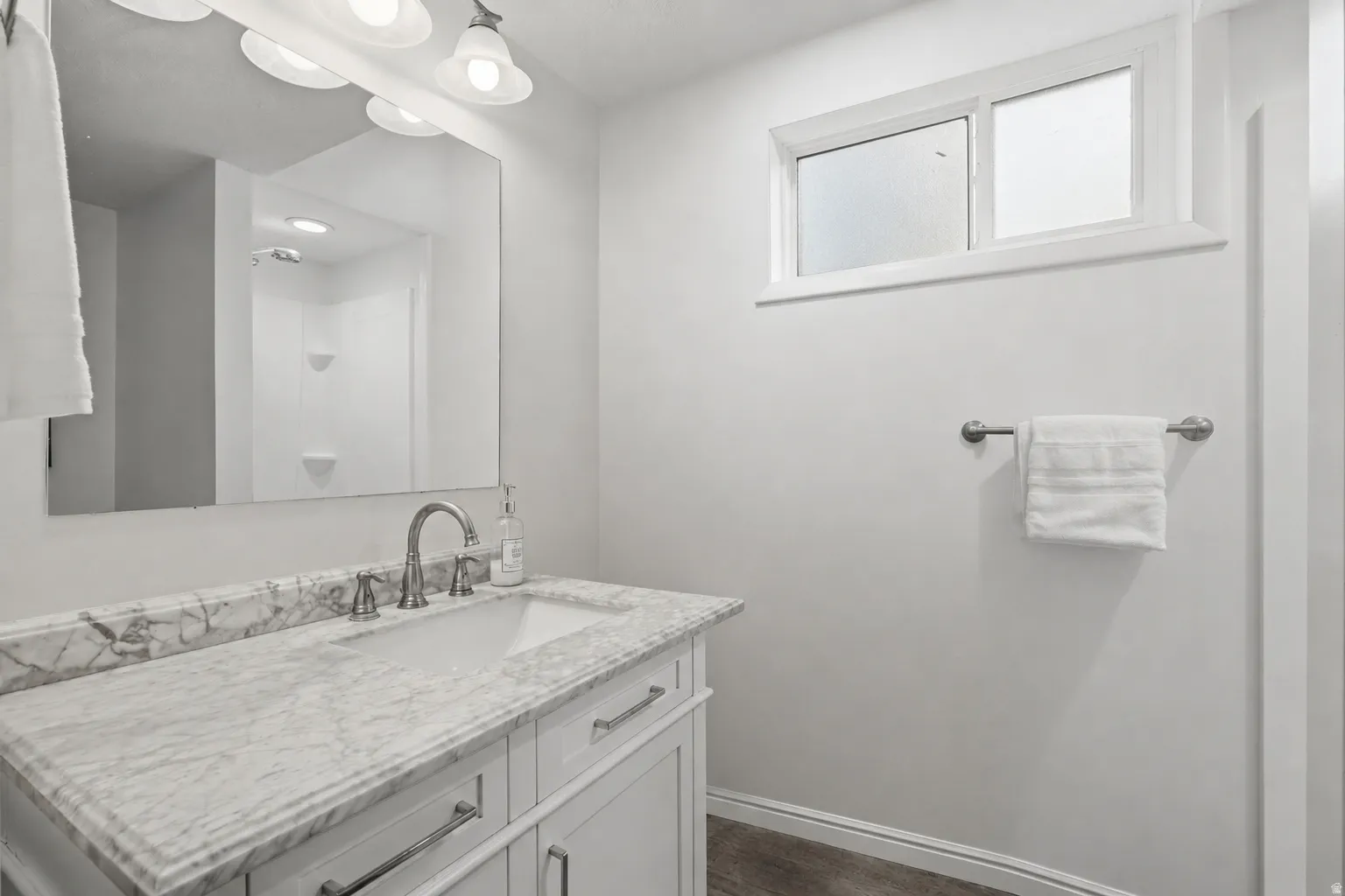 Laundry hookups are in this bathroom