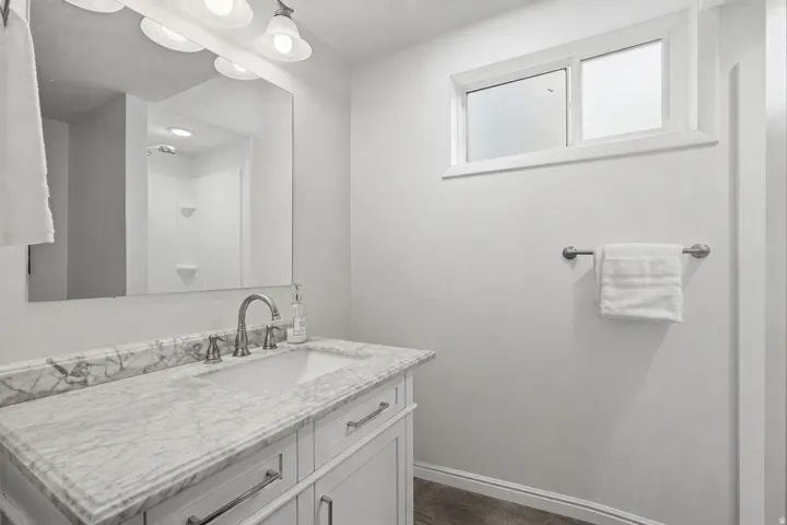 Laundry hookups are in this bathroom
