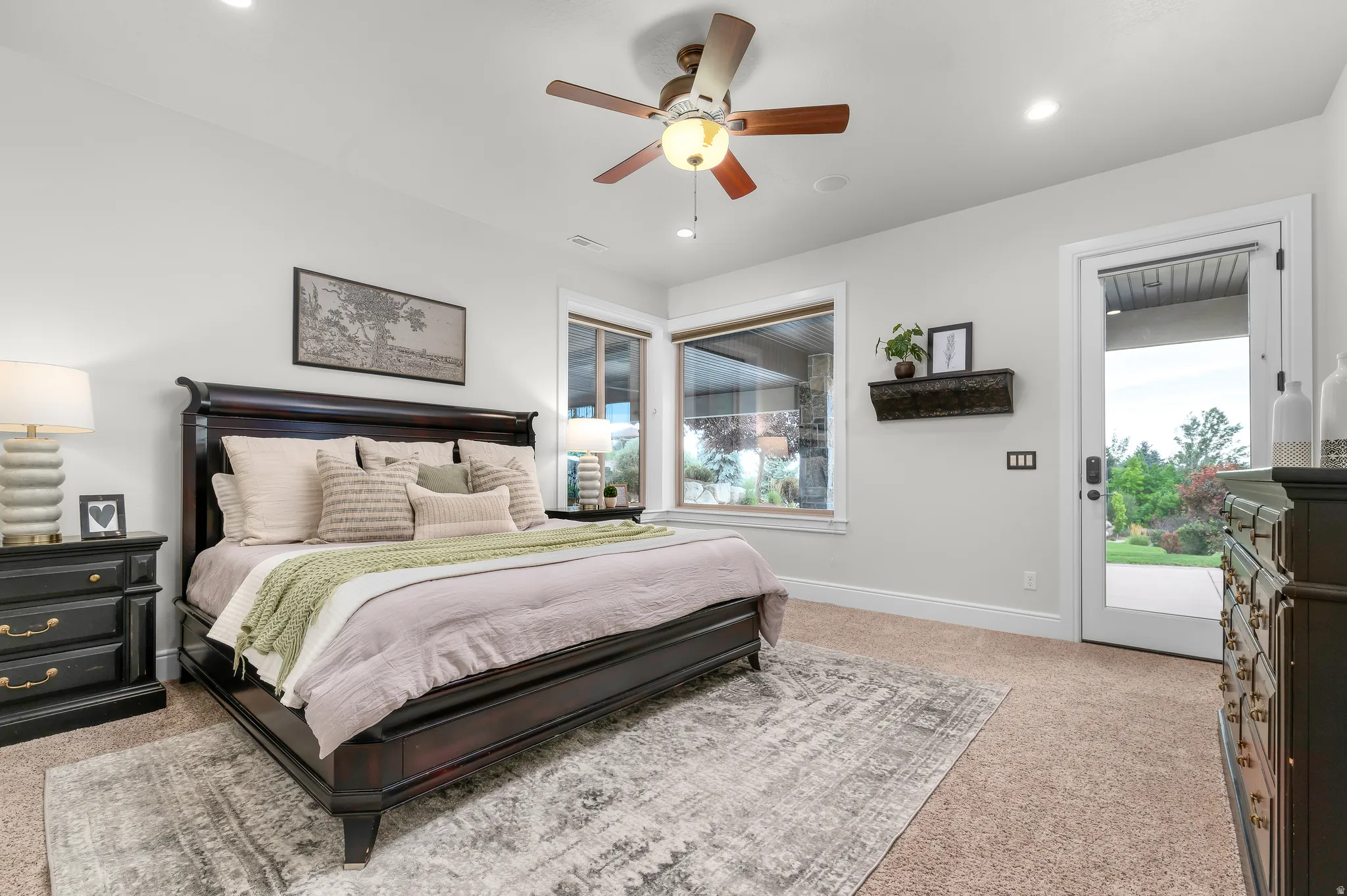 Plush carpeting and recessed lighting create a comfortable atmosphere