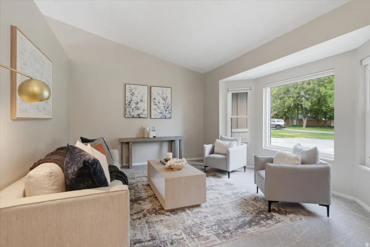 Light-filled formal sitting room offers flexible space just off the main entry.