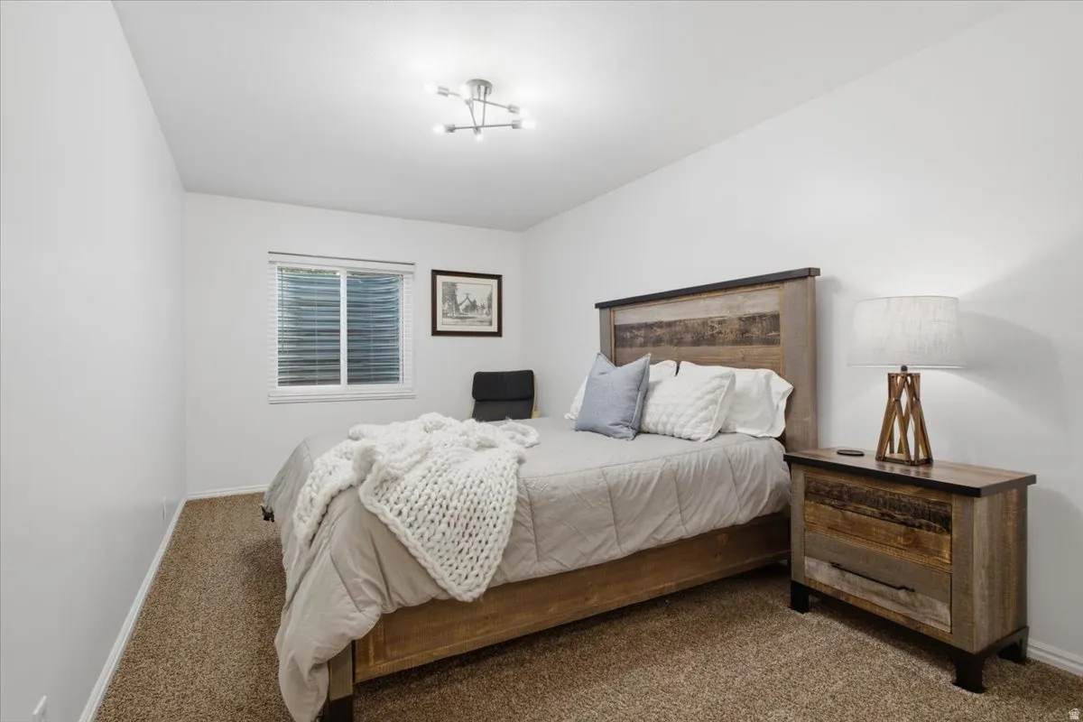 One of three lower-level bedrooms offering comfortable additional living space.