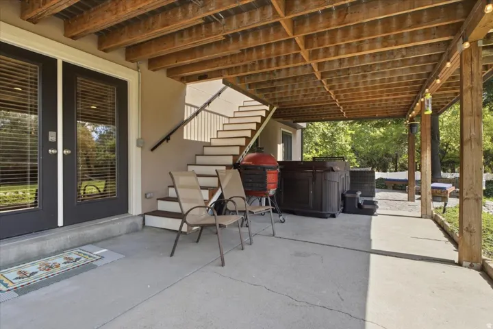 Walkout basement opens to a covered patio for easy indoor-outdoor living.