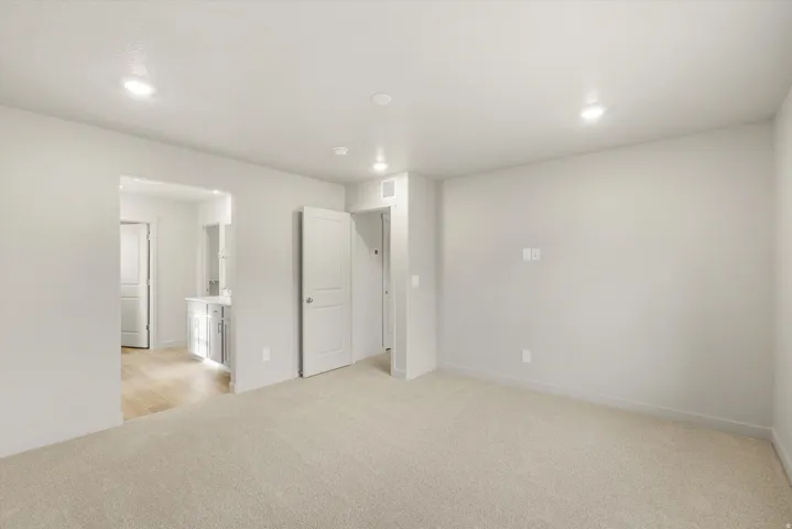**DISCLAIMER** This floorplan has upgrades not photographed.Soft carpet flooring, recessed lighting, white interior doors, and a neutral wall palette